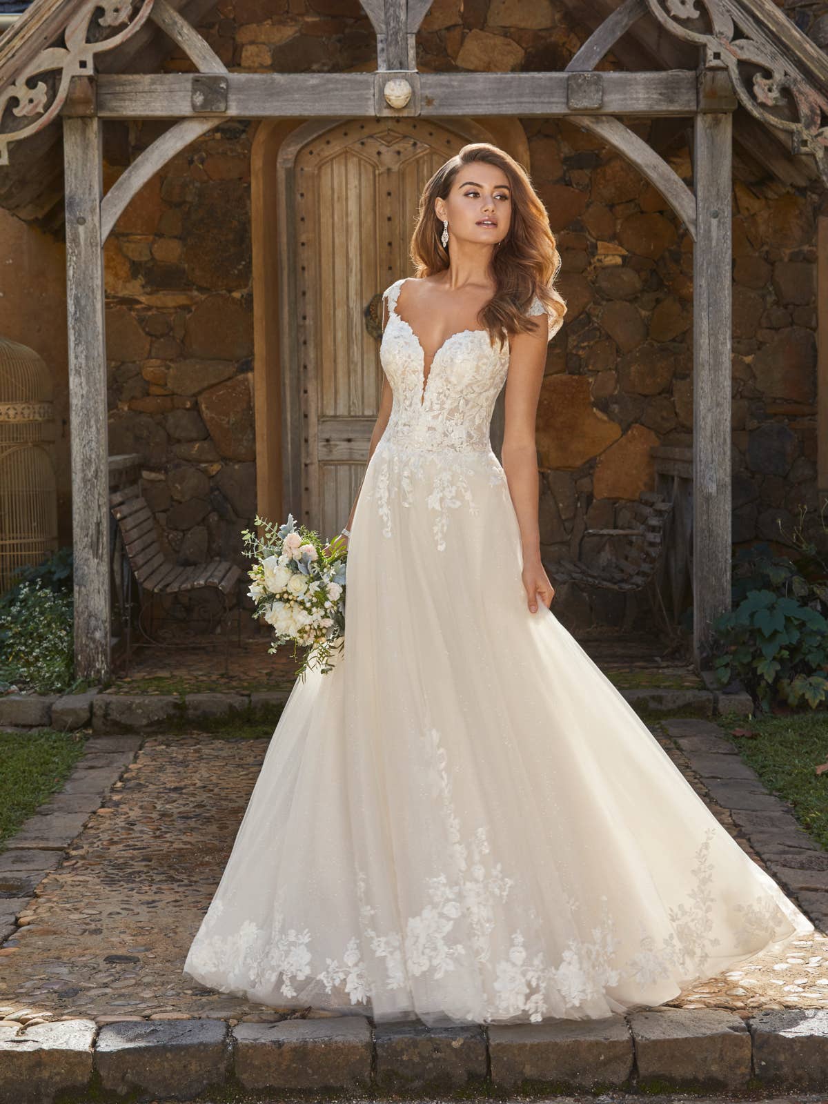 20103 Ein wunderschönes A- Linien Brautkleid aus Tüll und Glitzertüll.